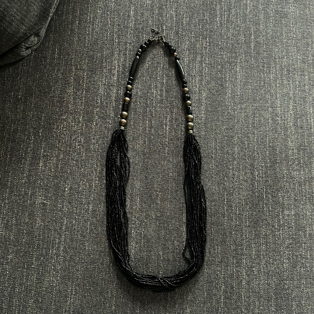 Black women’s long beaded necklace